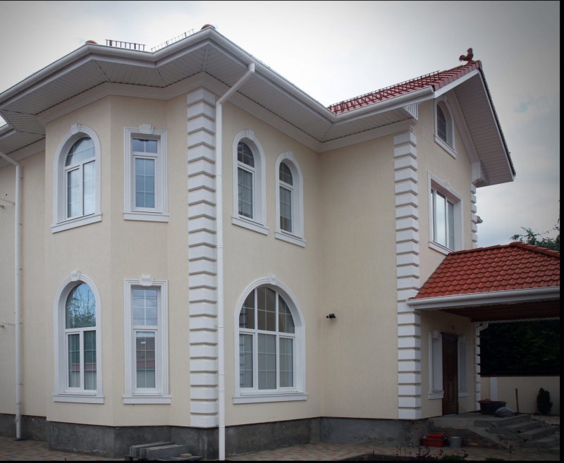 Фасады домов штукатурка