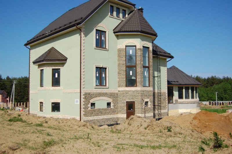 Фасады домов из штукатурки