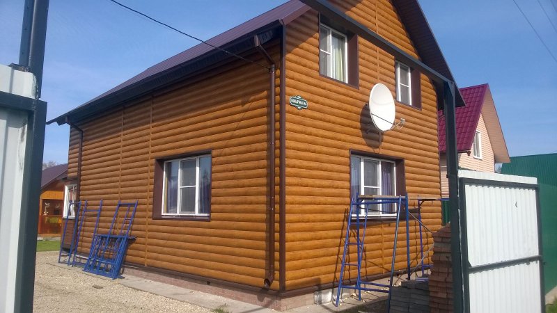 Мансарда из металлического сайдинга под бревно