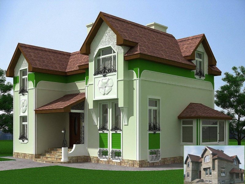 Красивый дом с зеленой крышей
