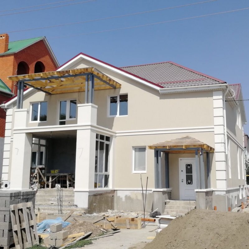 Камешковая декоративная штукатурка фасадов домов