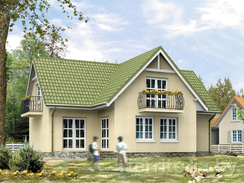 Светлый дом с зеленой крышей