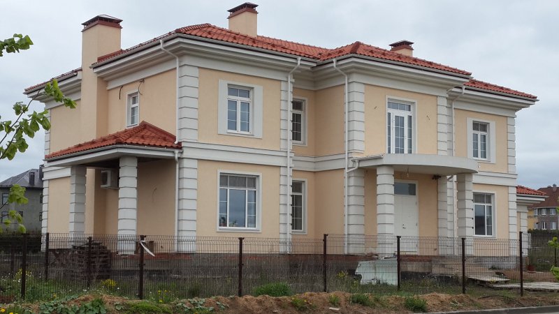 Фасады домов штукатурка