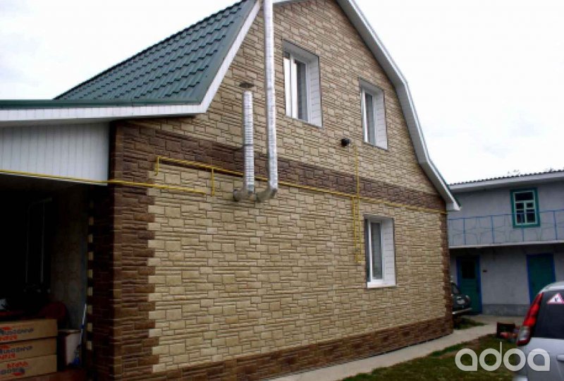Облицовка дома сайдингом под камень