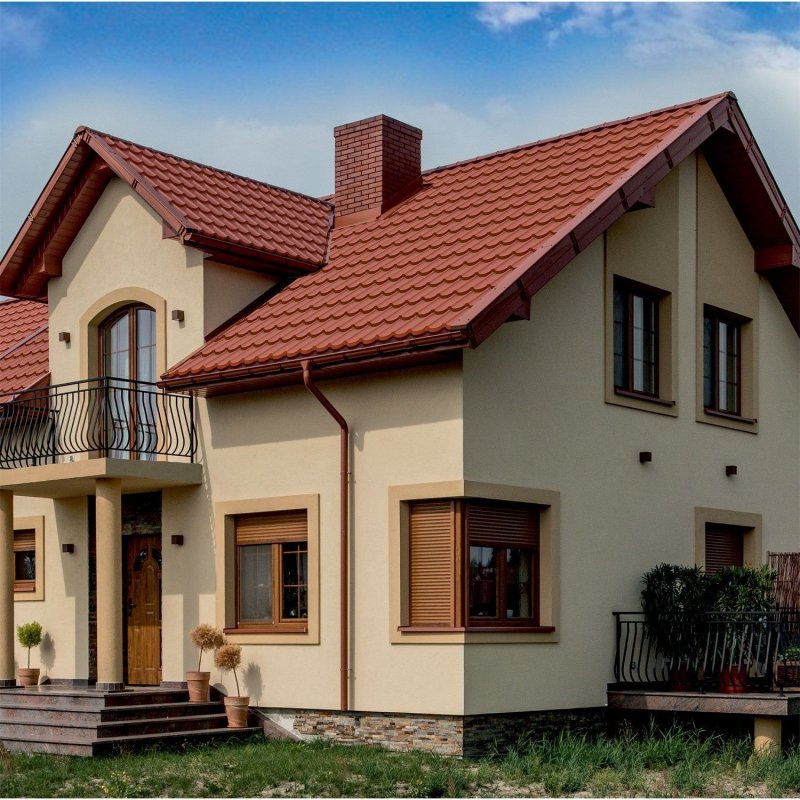 Фасад с терракотовой крышей