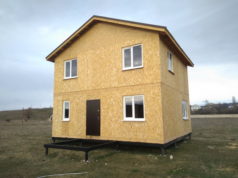 Отделка фасада дома из СИП панелей
