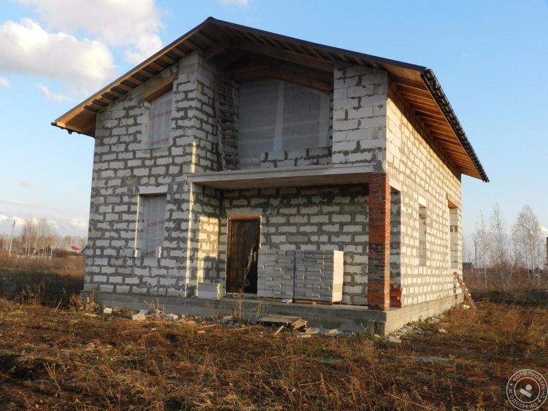 Баня из пеноблоков обшитая с террасой