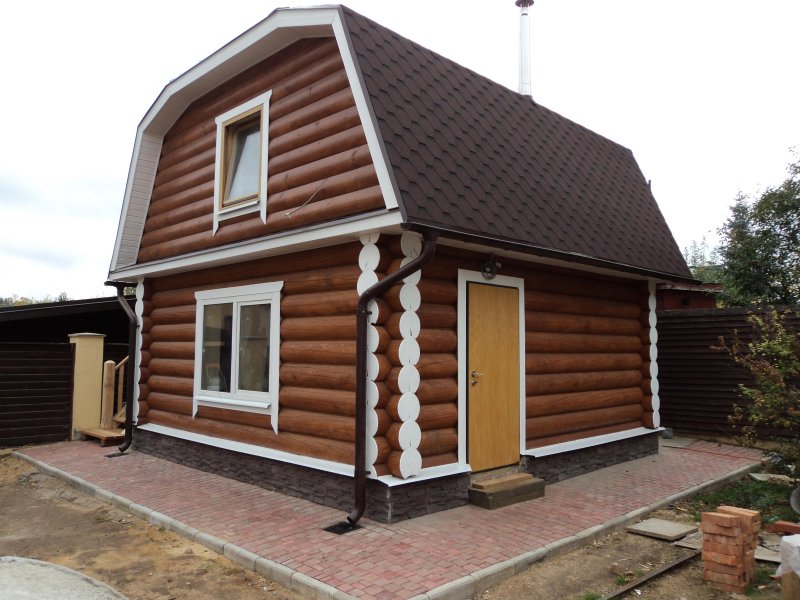 Отделка дачи из бревна снаружи