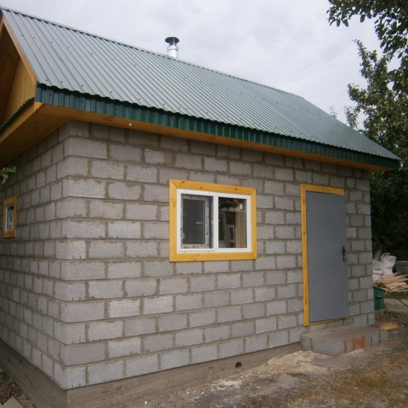 Дом из шлакоблока г образная