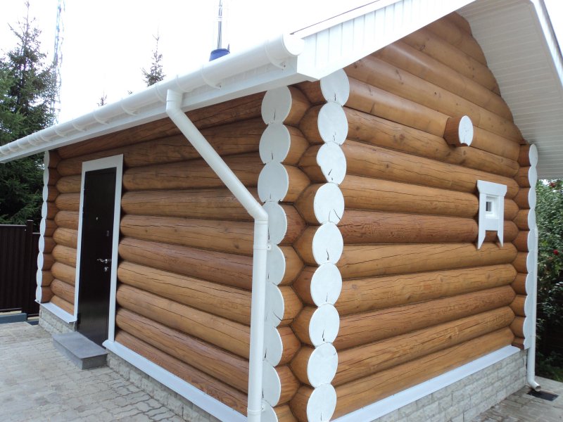 Наружная отделка бани из бревна