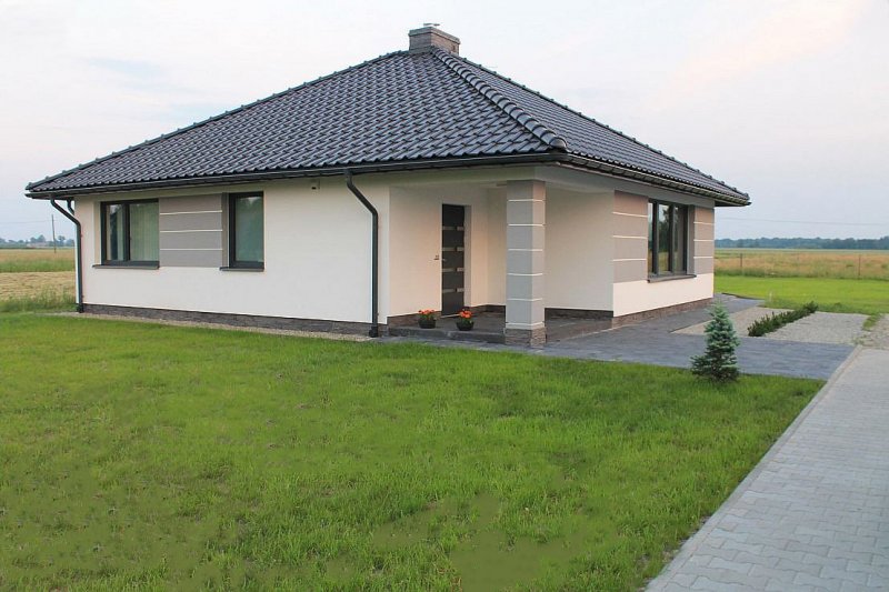 Дом с четырехскатной крышей