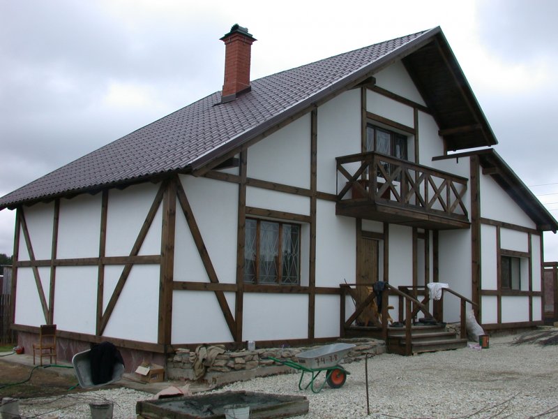 Фасады дома с камнем и планкеном