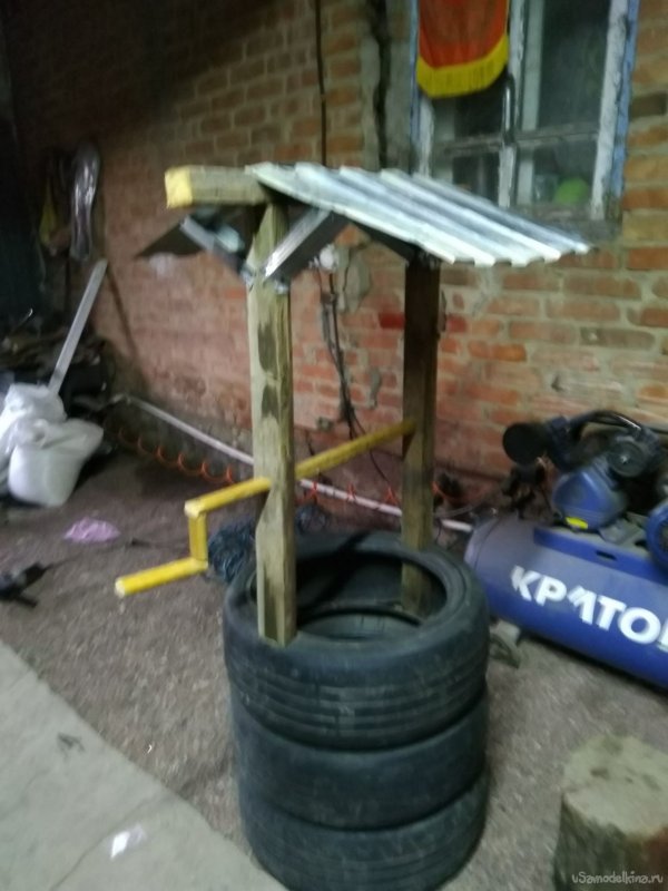 Колодец из колес для сада
