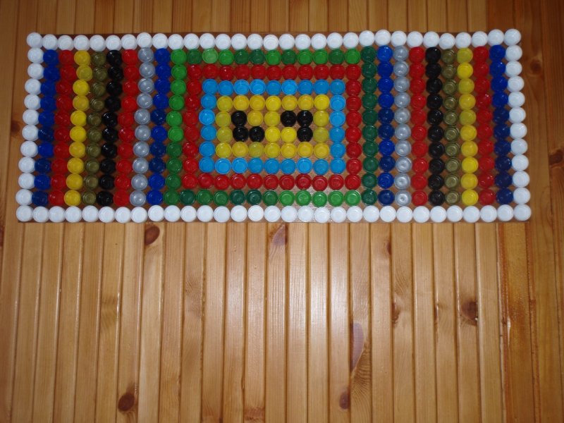 Коврик из крышек