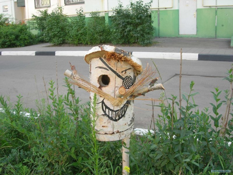 Фигуры из поленьев