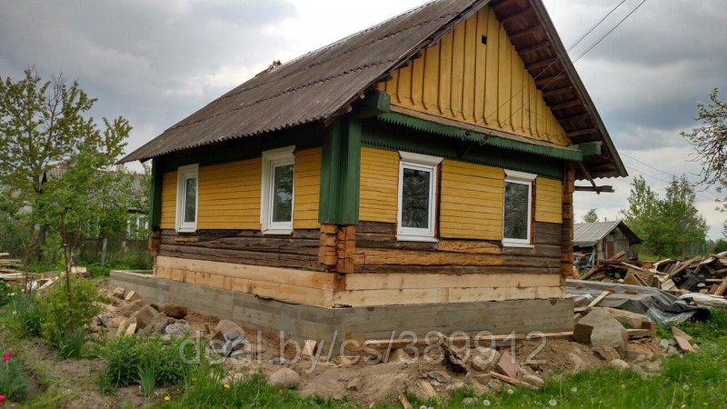 Перестройка крыши старого бревенчатого дома