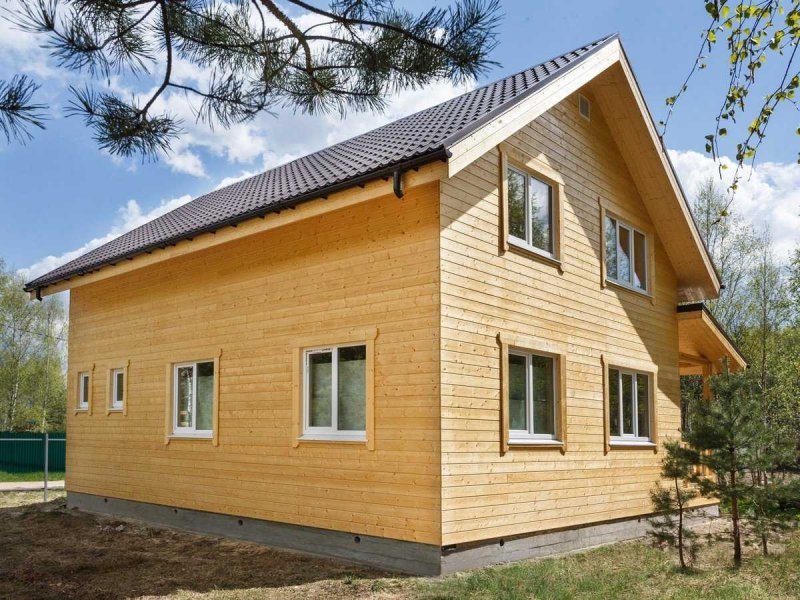 Дом обшитый фальшбрусом