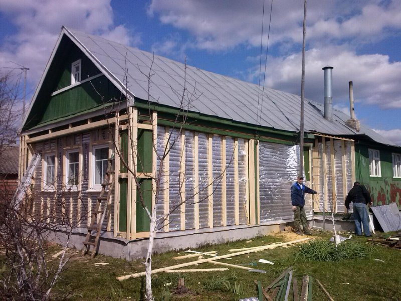 Дом из сайдинга под камень