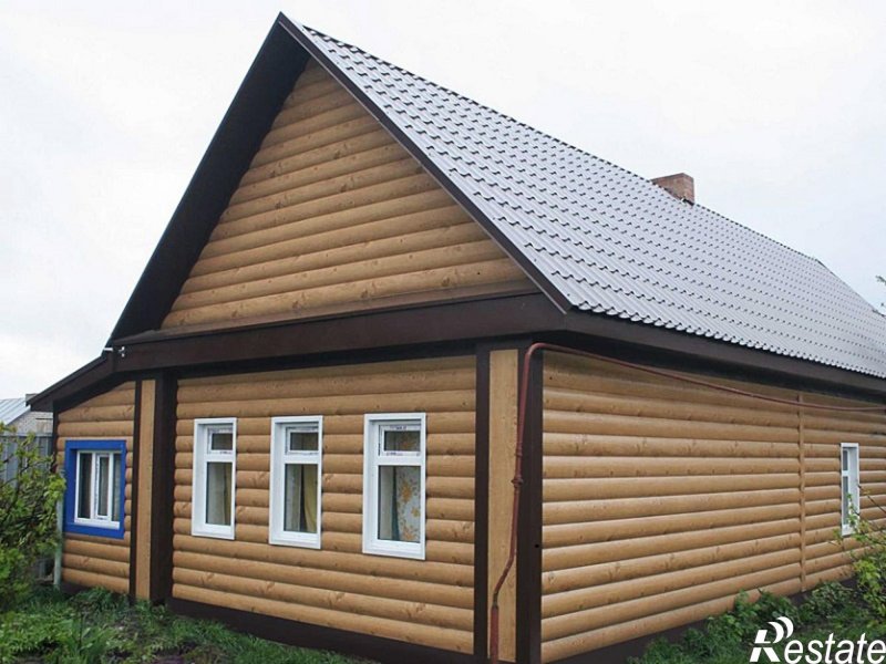 Отделка сайдингом дачного домика