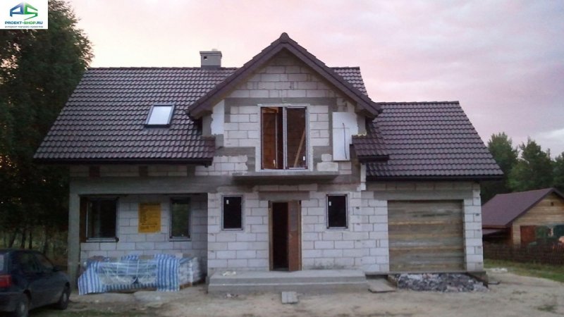Двухэтажный дом с гаражом из пеноблоков
