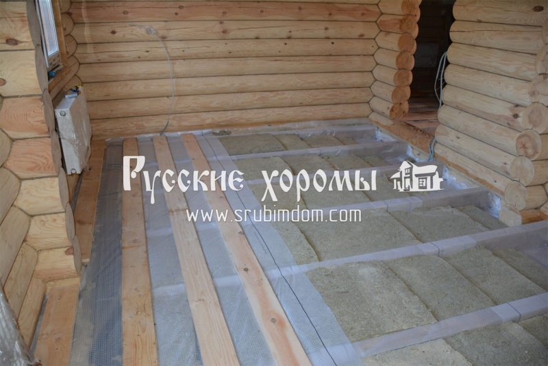 Пирог теплого пола в доме из бревна