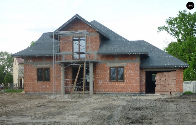 Дом реальный из кирпича с мансардой