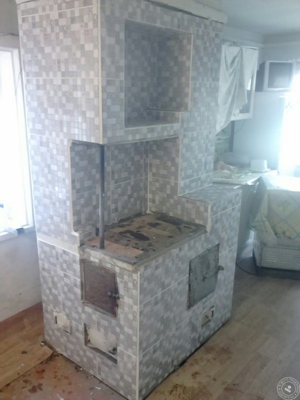 Оклейка печи плиткой