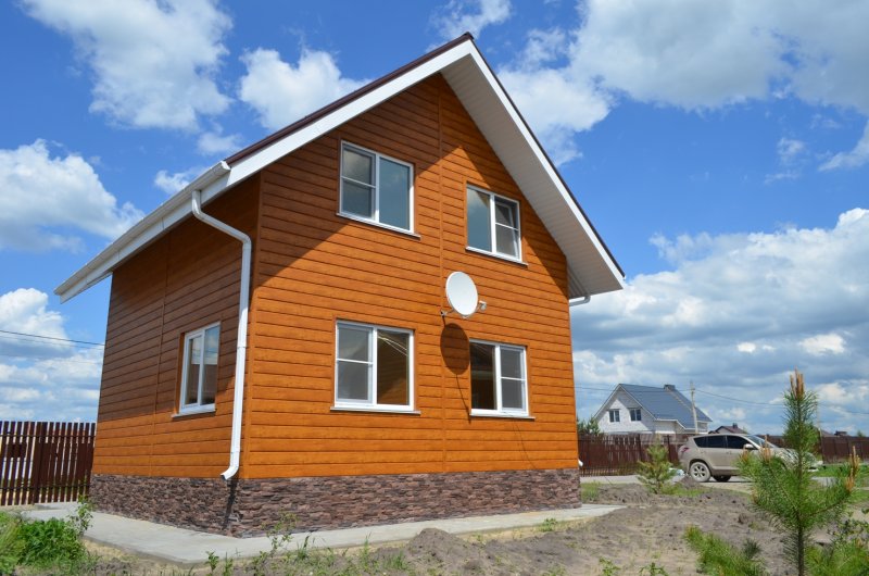 Металлический сайдинг ЭКОБРУС Grand line под дерево