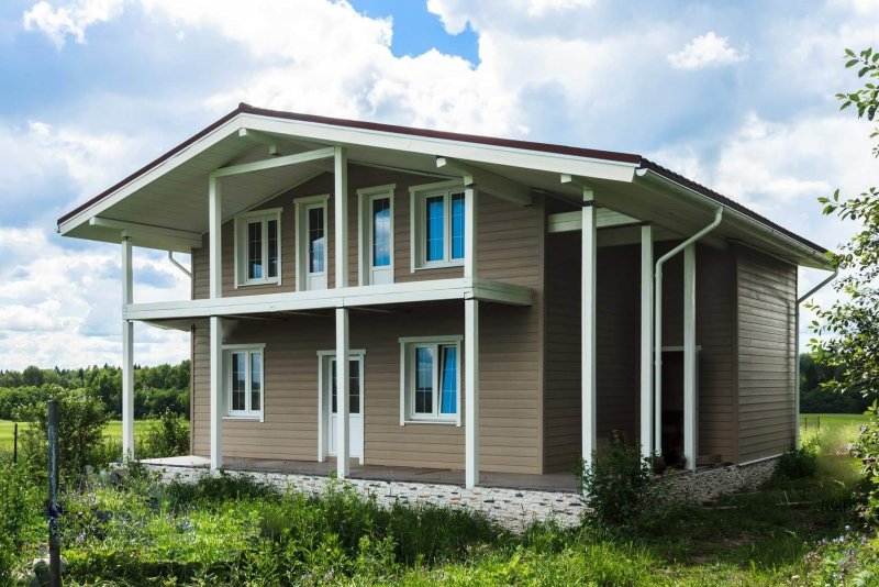 Фиброцементным сайдингом Cedral