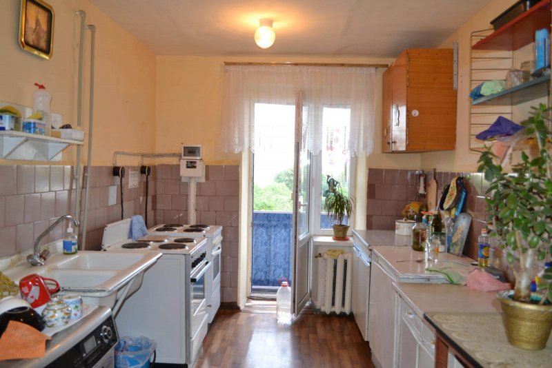 Комната в коммуналке с кухней