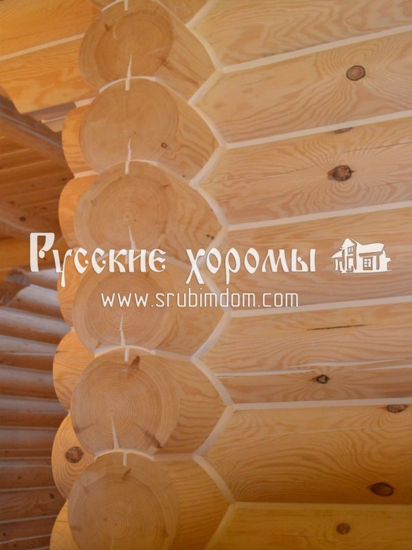 Тёплый шов темного цвета для деревянных домов