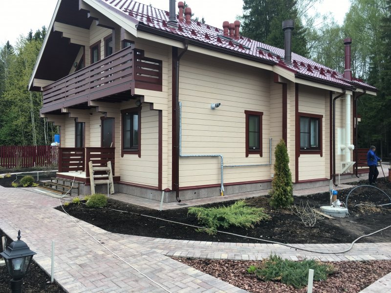 Покраска деревянного дома снаружи