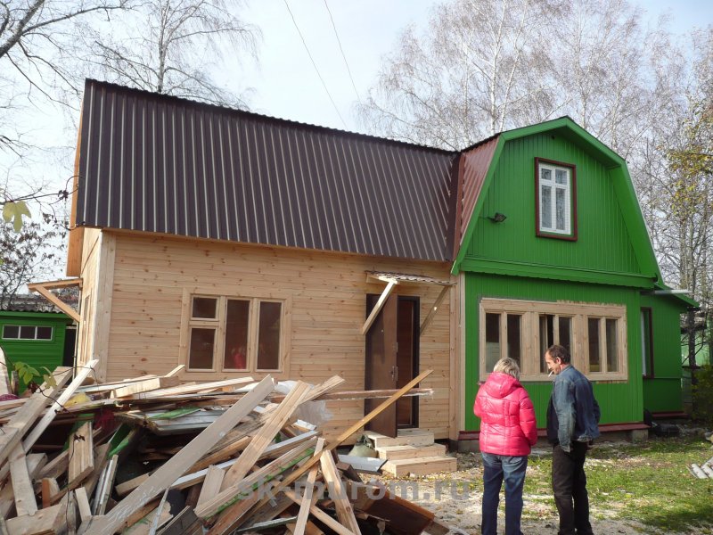 Двухэтажная пристройка к дачному дому
