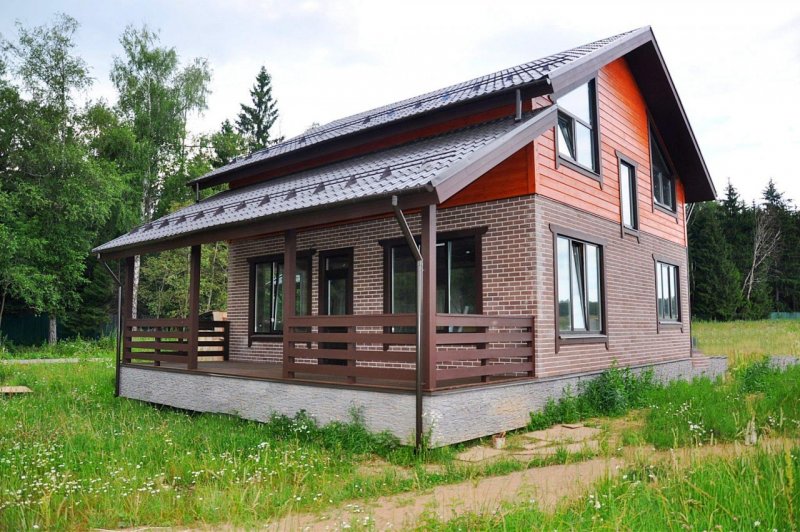 Комбинированный дом из кирпича и бруса