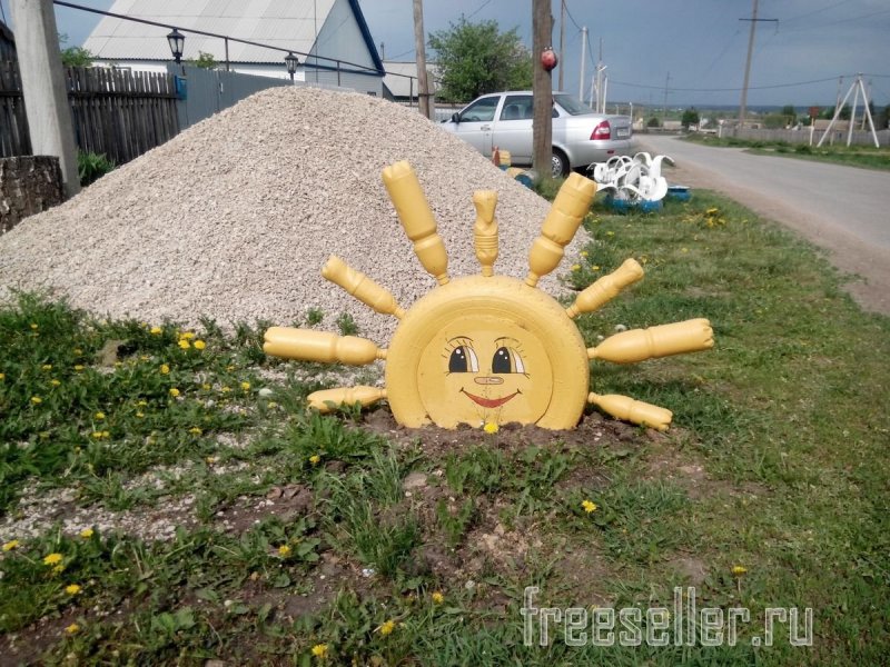 Солнышко из шин