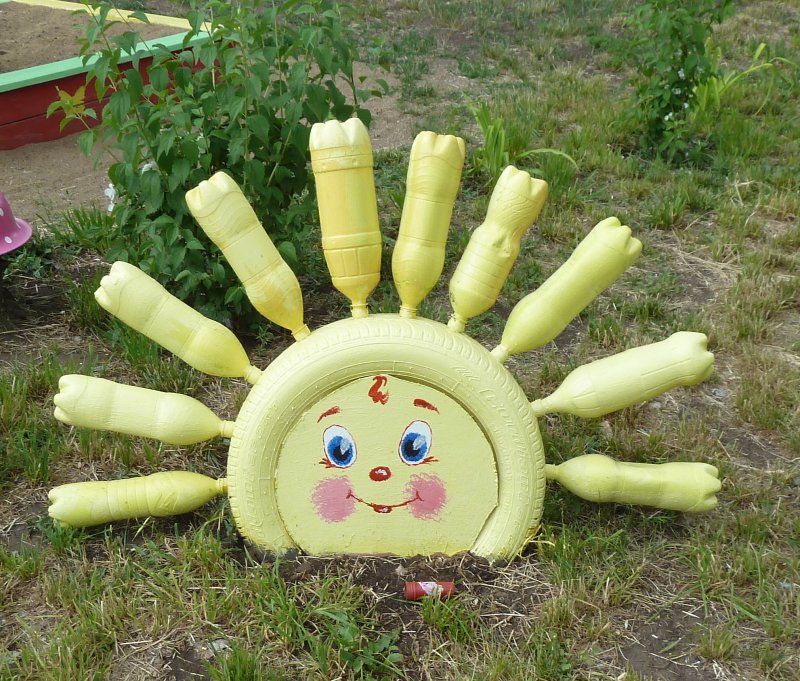 Солнышко из покрышек