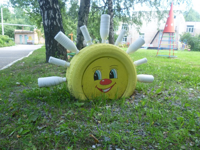 Солнце из покрышки