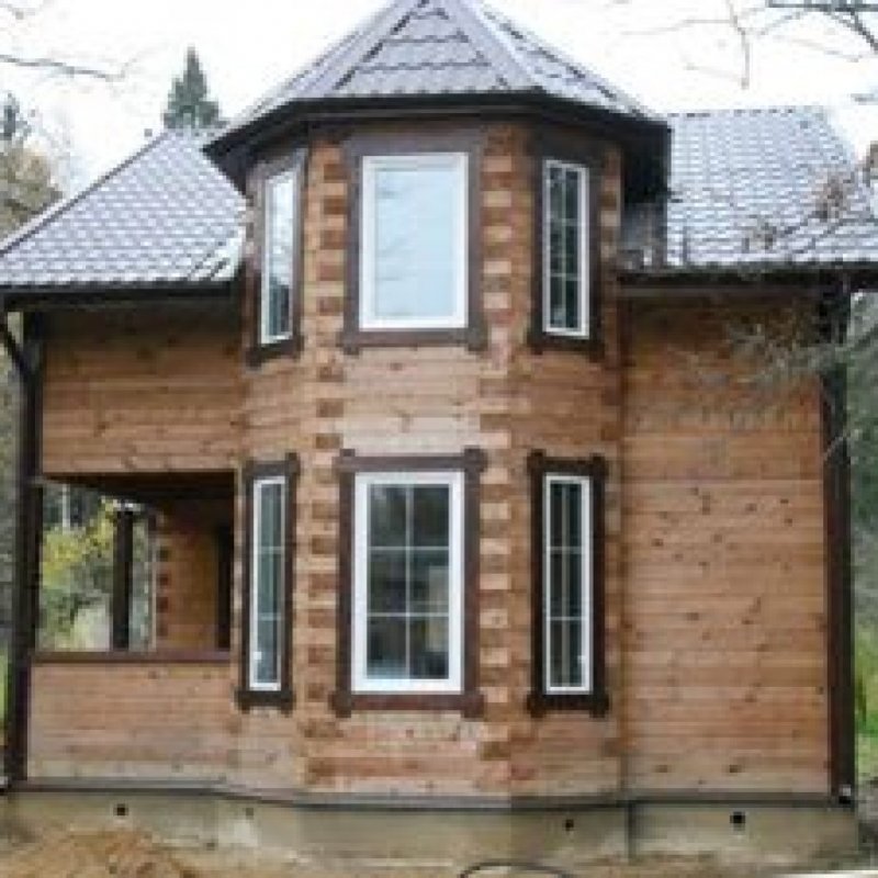 Фасадные панели дом с эркером