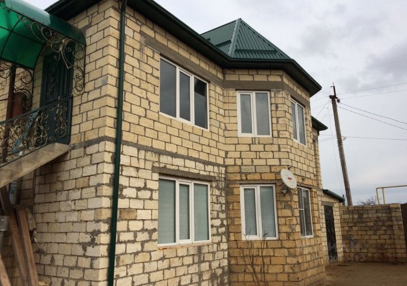 Дома из дагестанского камня и планкена