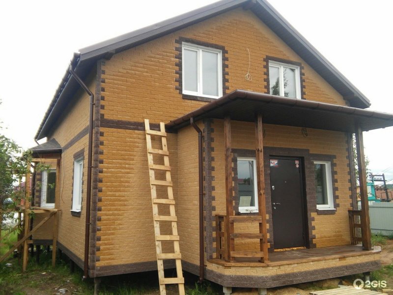 Каркасный дом с отделкой камнем