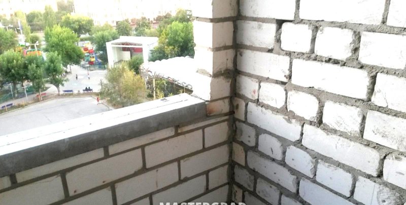 Дом из пеноблоков с гаражом и мансардой