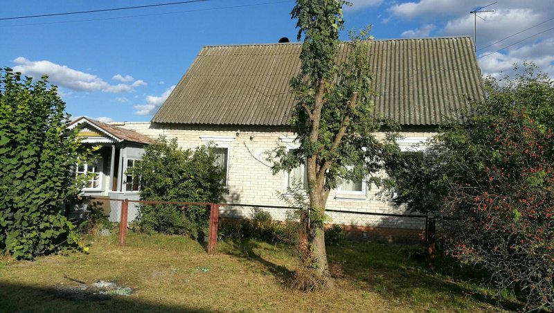 Дом из белого кирпича