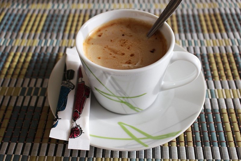 Чашечка кофе с молоком