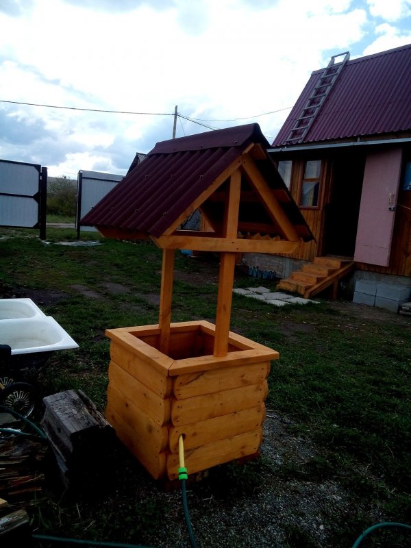 Многоярусная клумба из шин