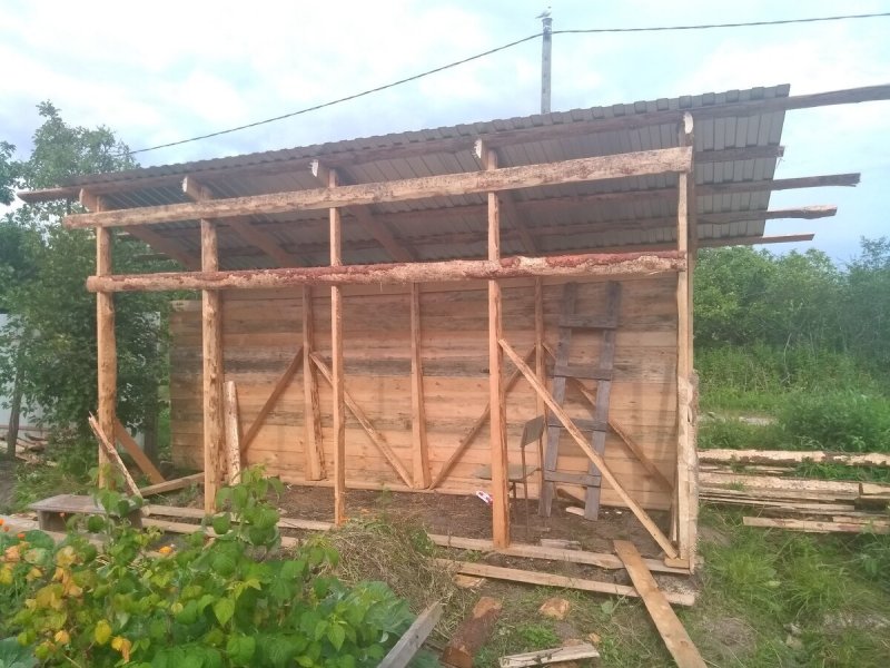 Обшивка сарая доской