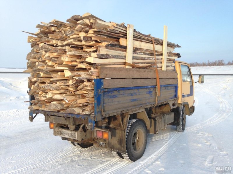 КАМАЗ 4310 бортовой старый с дровами