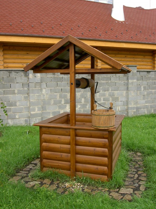 Домик для колодца каменный