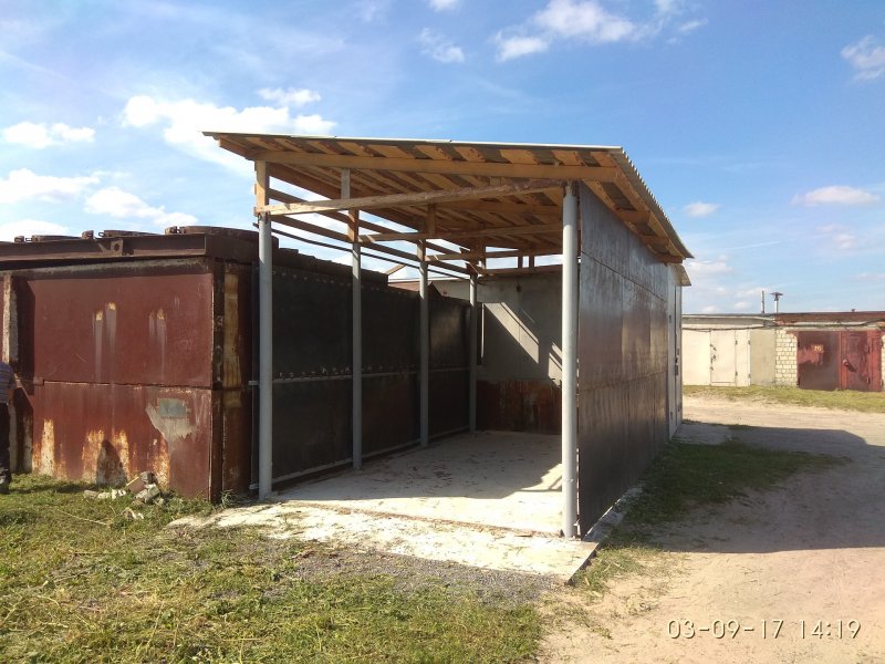 Металлический гараж пристроенный к дому