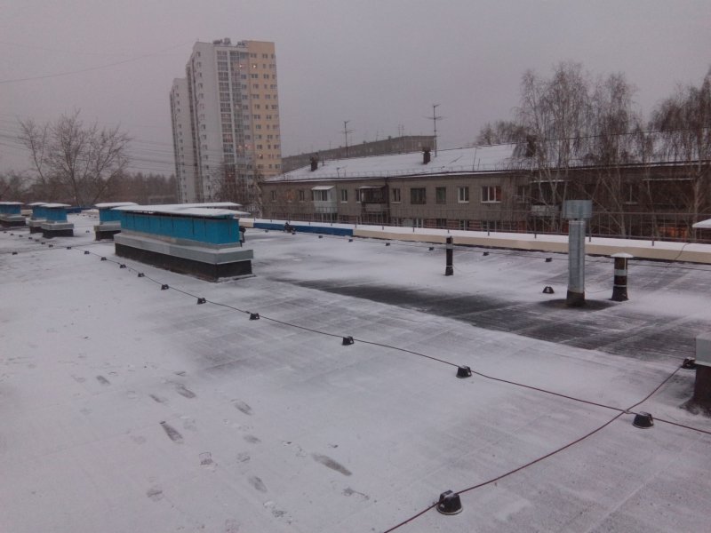 Выровнять крышу гаража