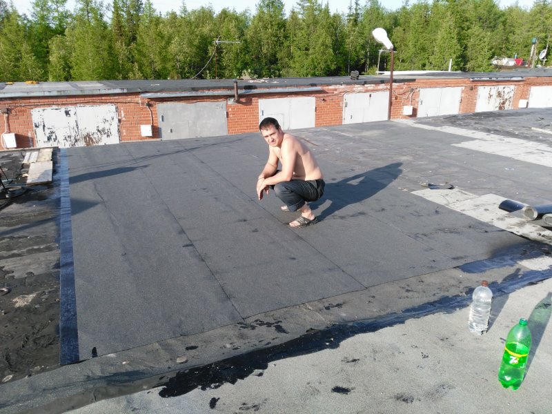 Выровнять крышу гаража